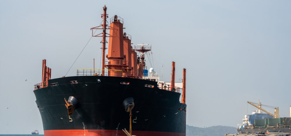 cargo ship in the ocean for export import goods from cargo yard